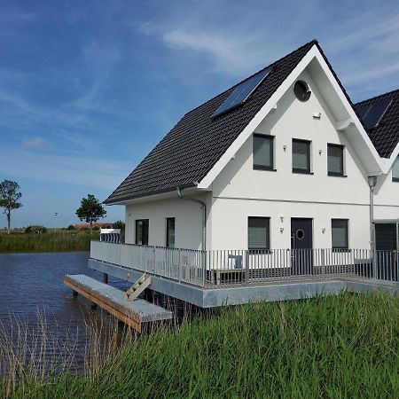 Nr 110 - Ferienhaus Seeperle Pfahlhaus Auf Der Harle 卡罗利嫩西尔 外观 照片