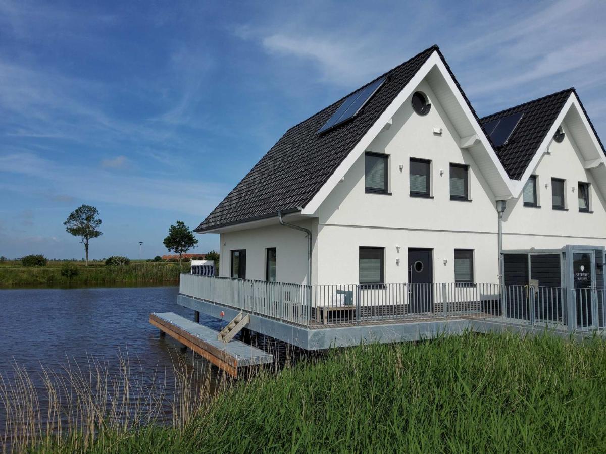 Nr 110 - Ferienhaus Seeperle Pfahlhaus Auf Der Harle 卡罗利嫩西尔 外观 照片